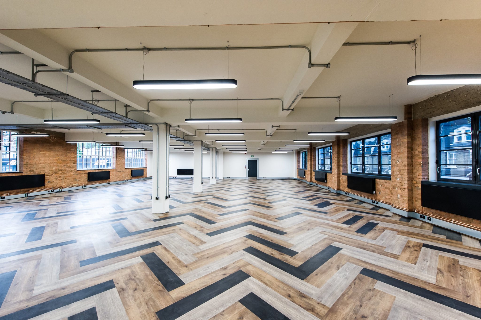 Industrial style CAT A office fitout at Spectrum House, London.