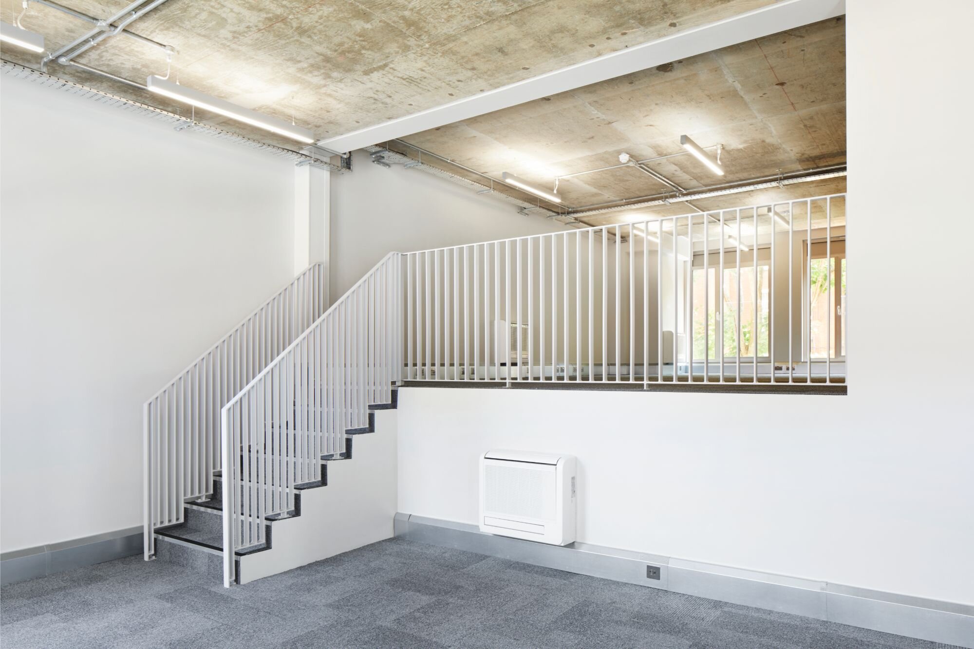 Office lighting for a Grade II listed CAT A fitout at 4 Tavistock Place, London.