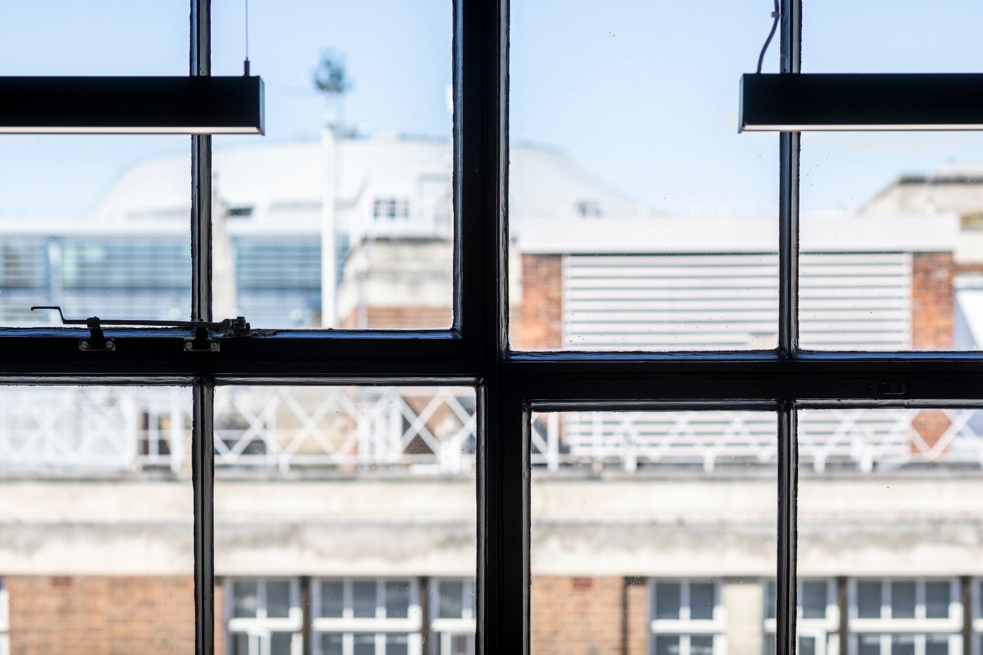 Office lighting for an industrial style CAT A fitout at 11 Old Jewry, London.