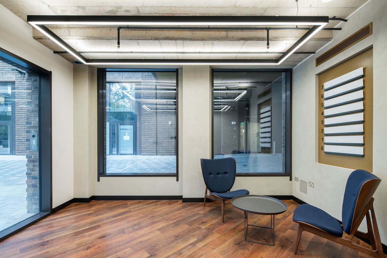 Shape Psychology.-linear-rectangular-lighting-reception-area