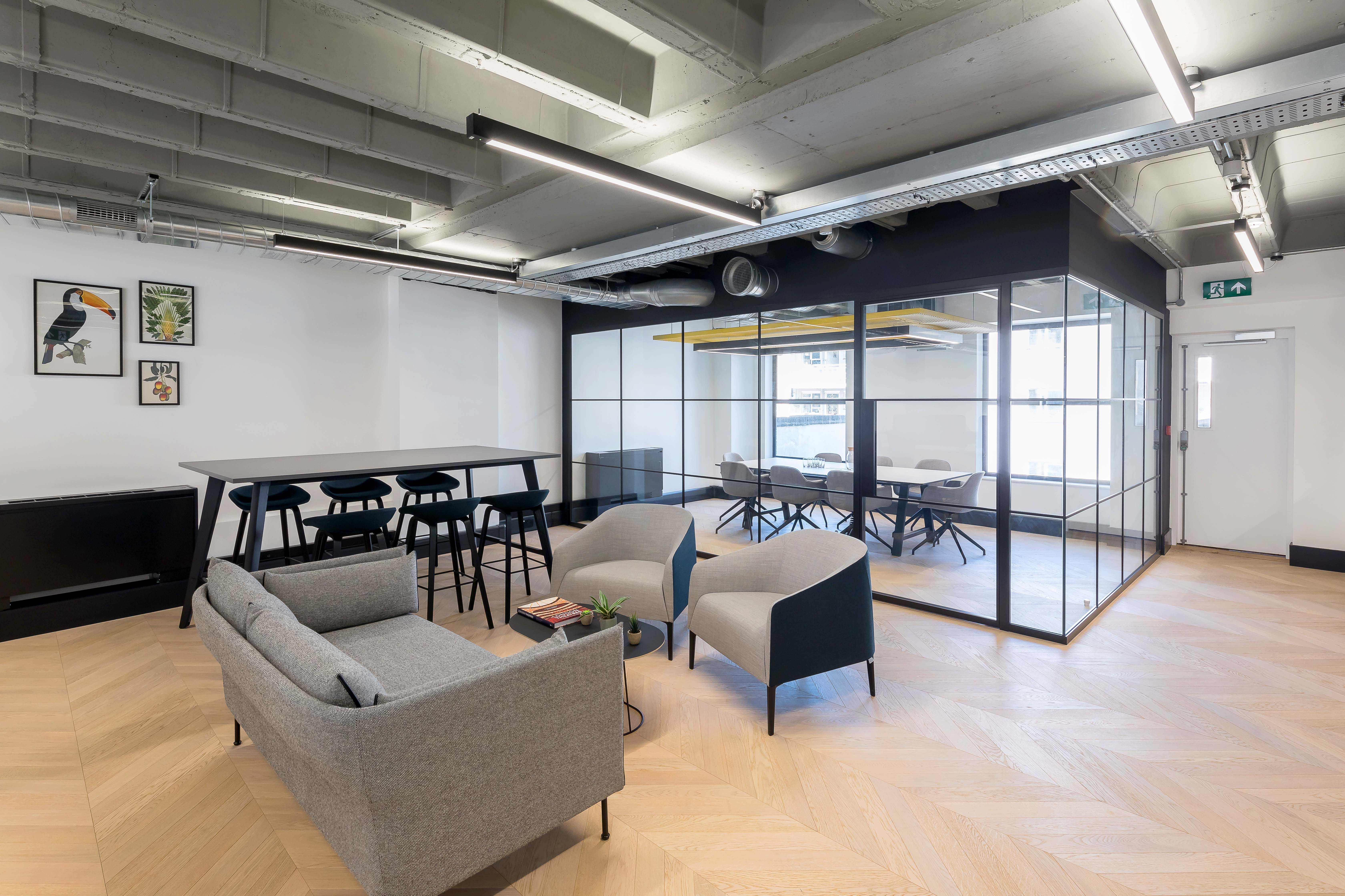 Office lighting for a CAT A+ fit out with exposed concrete soffits at 43 Eagle Street, London.