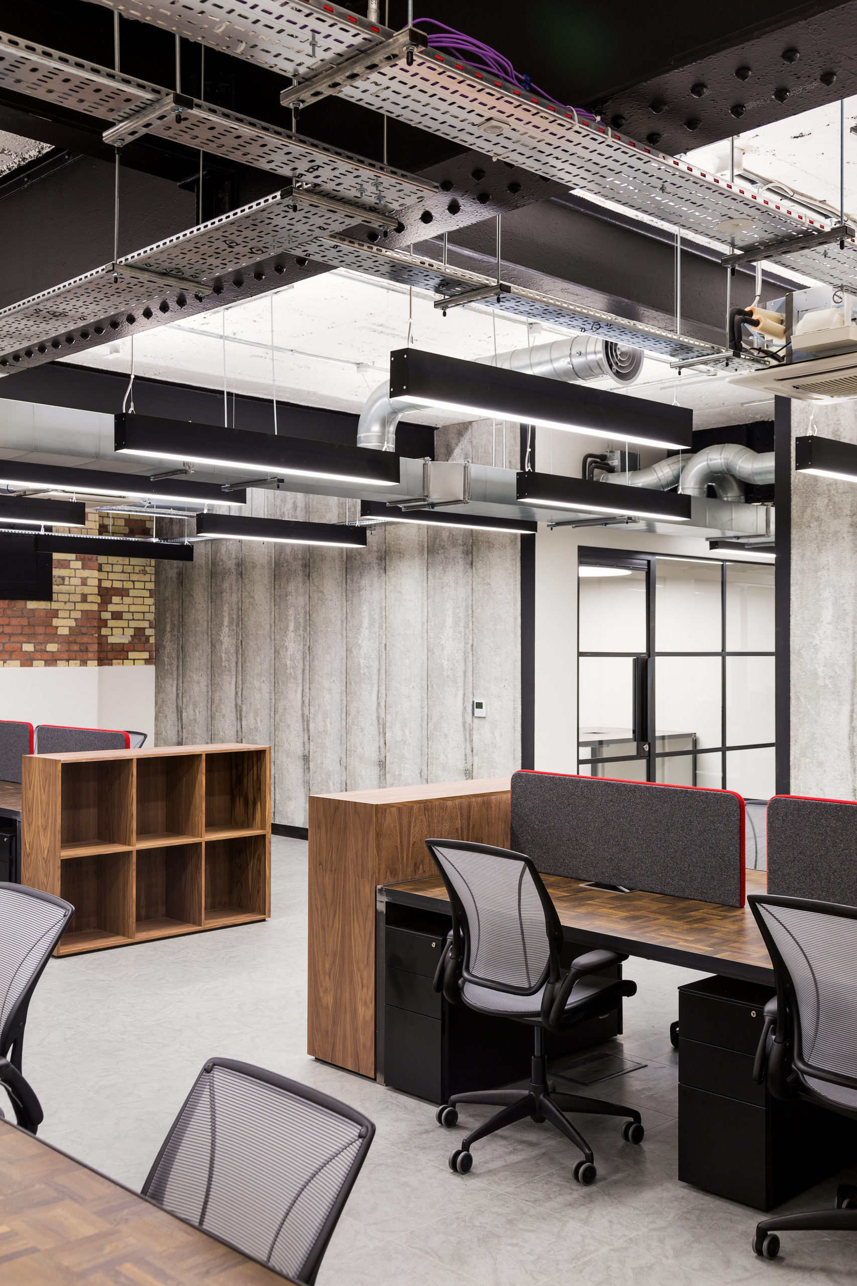 Slimline feature lighting for an open plan office at Canterbury Court, London.
