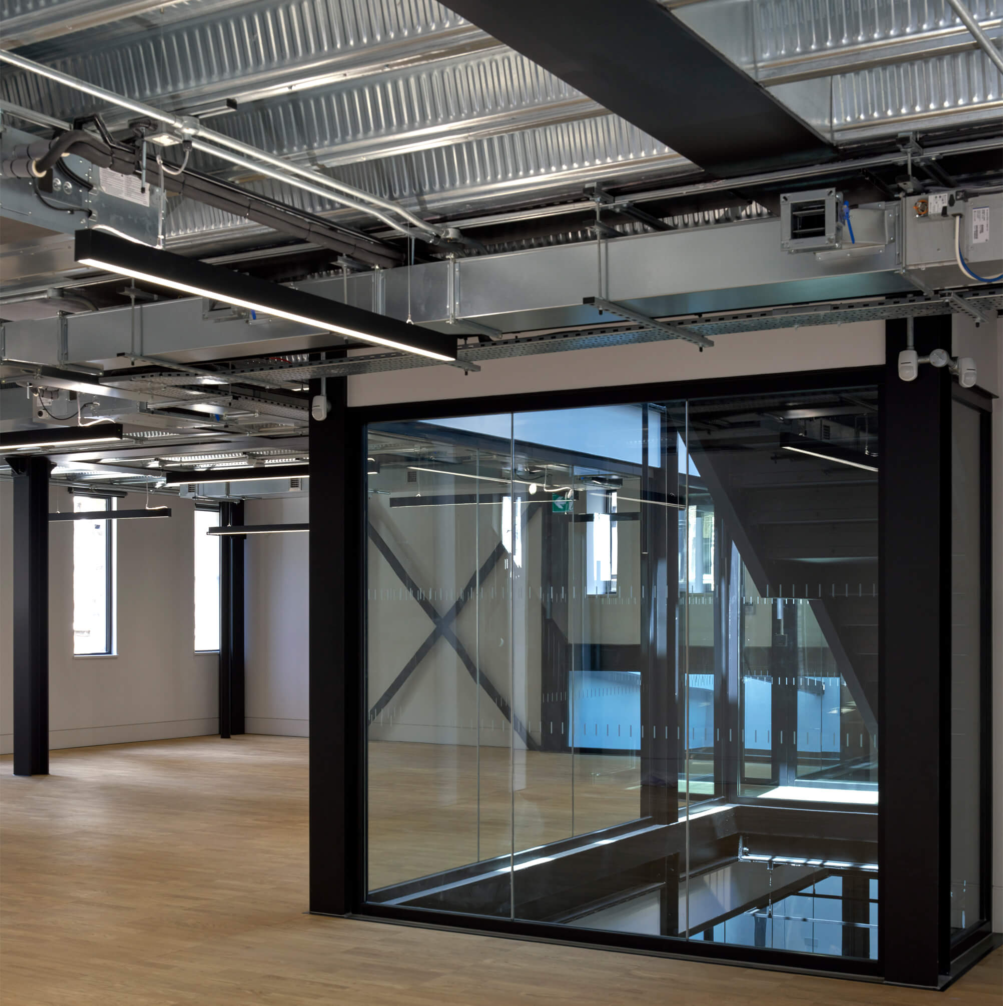 Office lighting for a sustainable BREEM-rated CAT A development at Plantworks, 1-3 Brittania Street, London.