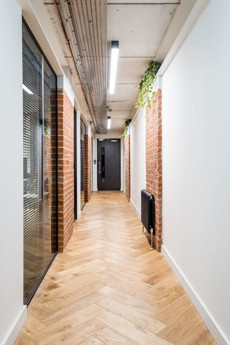 Office lighting for a fast-paced office fitout at Palm Tree Court, London.