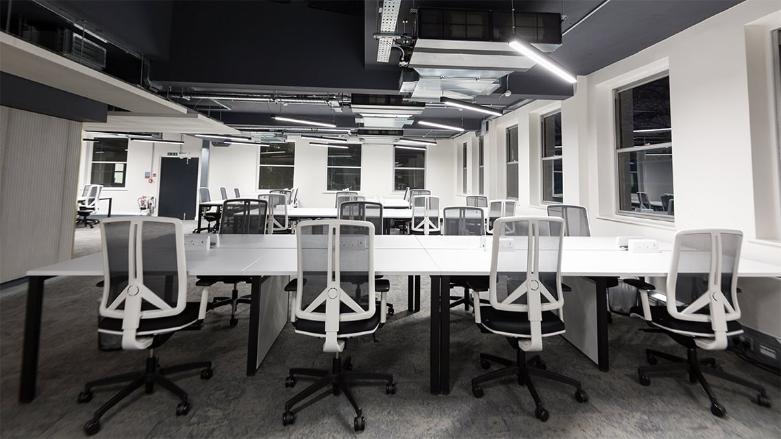 Office lighting for a design led serviced office space at 71-73 Carter Lane, London.