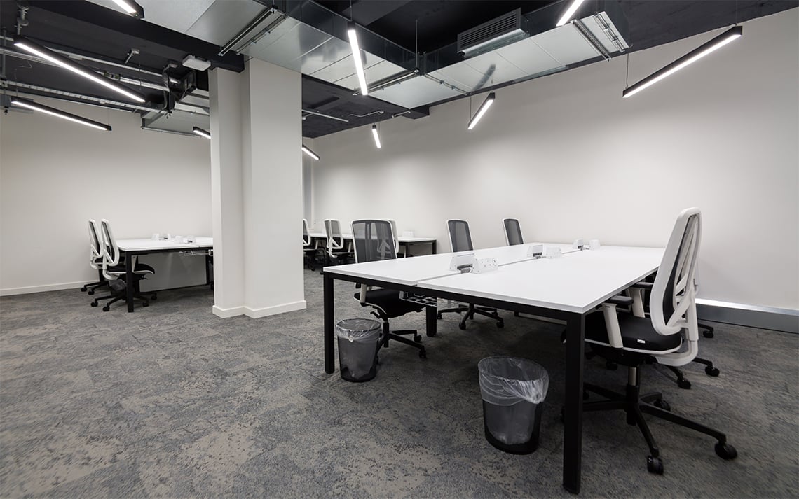 Office lighting for a design led serviced office space at 71-73 Carter Lane, London.