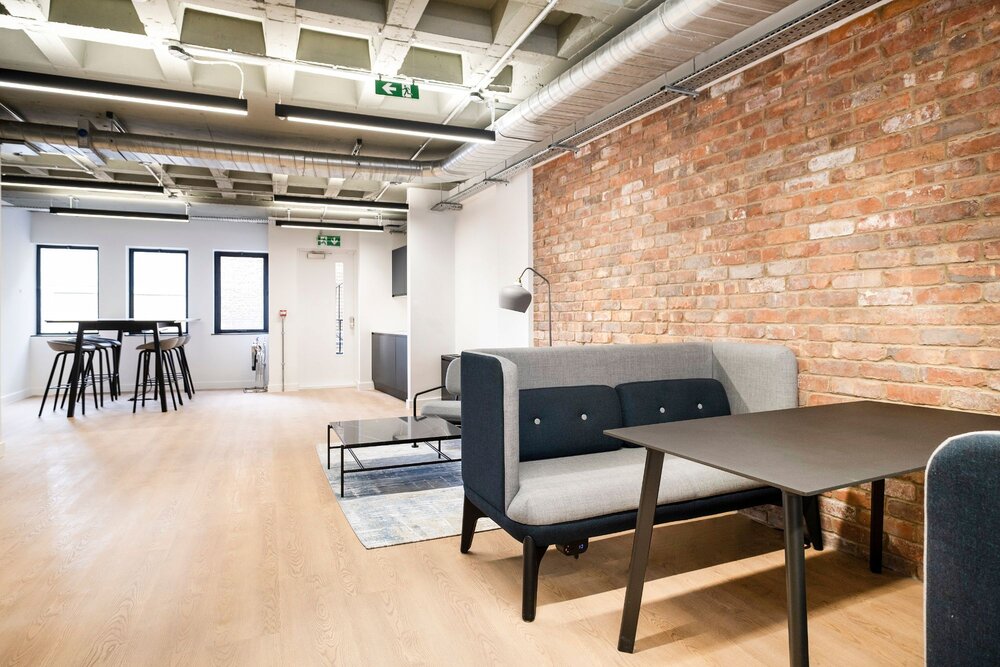 Office lighting for a CAT A fitout with concrete coffered slabs at 390 Strand, London.