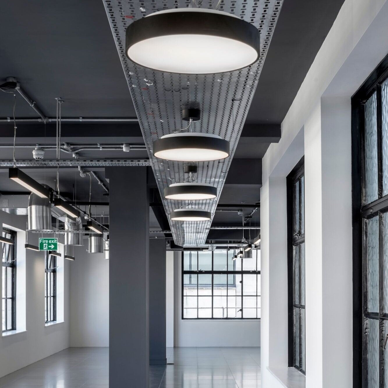 Bespoke architectural lighting for coffered slabs at Glen House, London.