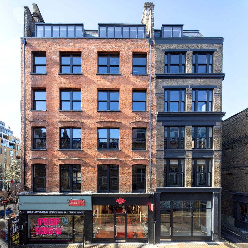 Office architectural lighting for a media style CAT A fitout at 82-84 Berwick Street, London.