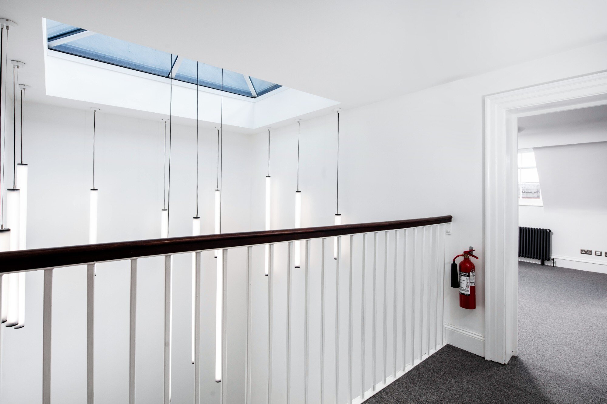 Architectural feature lighting for a CAT A office fitout at 9 Portland Square, Bristol.
