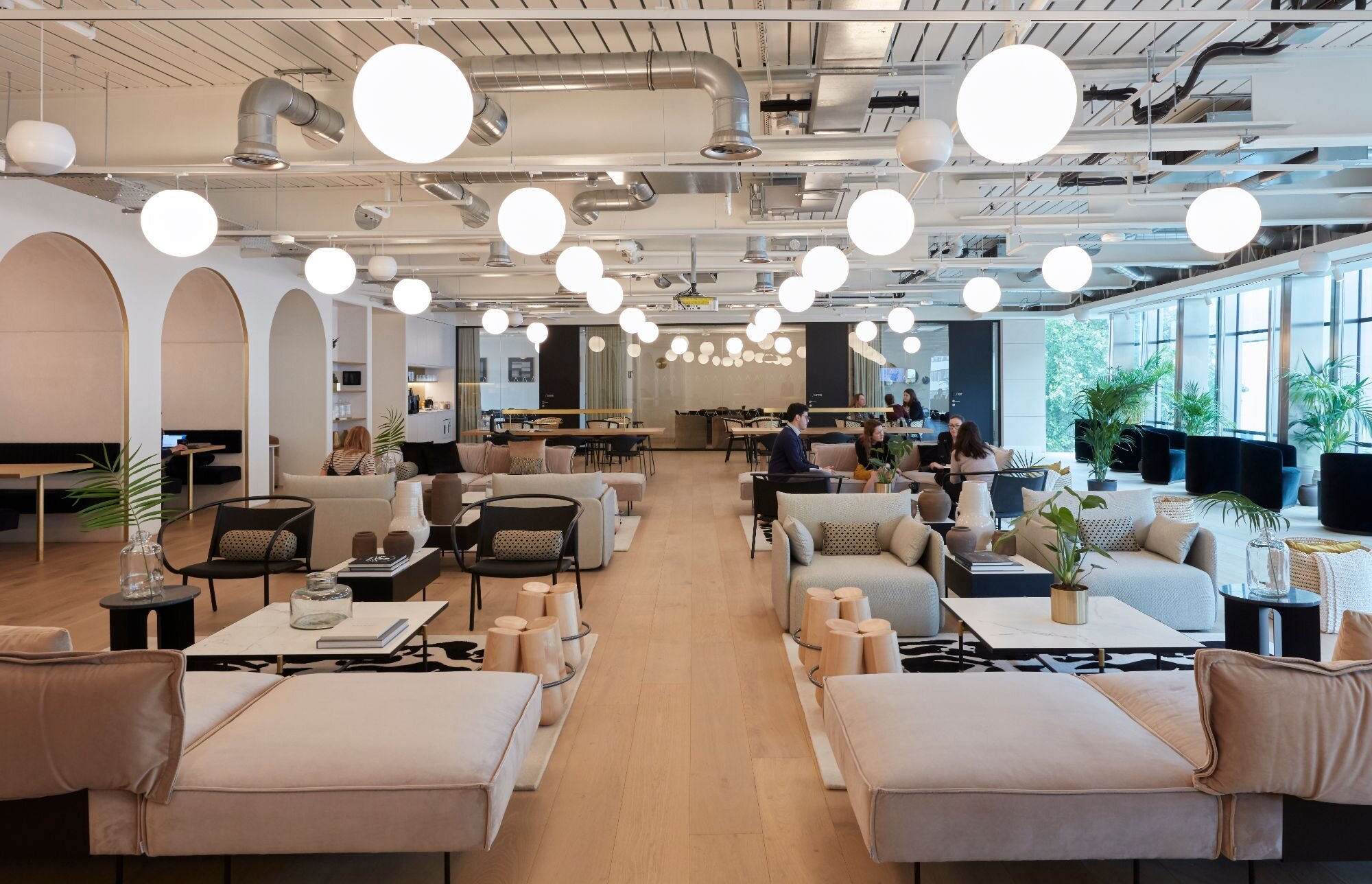 Suspended track lighting with decorative pendants at LABS 90 High Holborn, London.