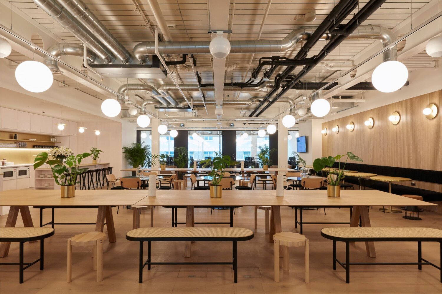 Suspended track lighting with decorative pendants at LABS 90 High Holborn, London.