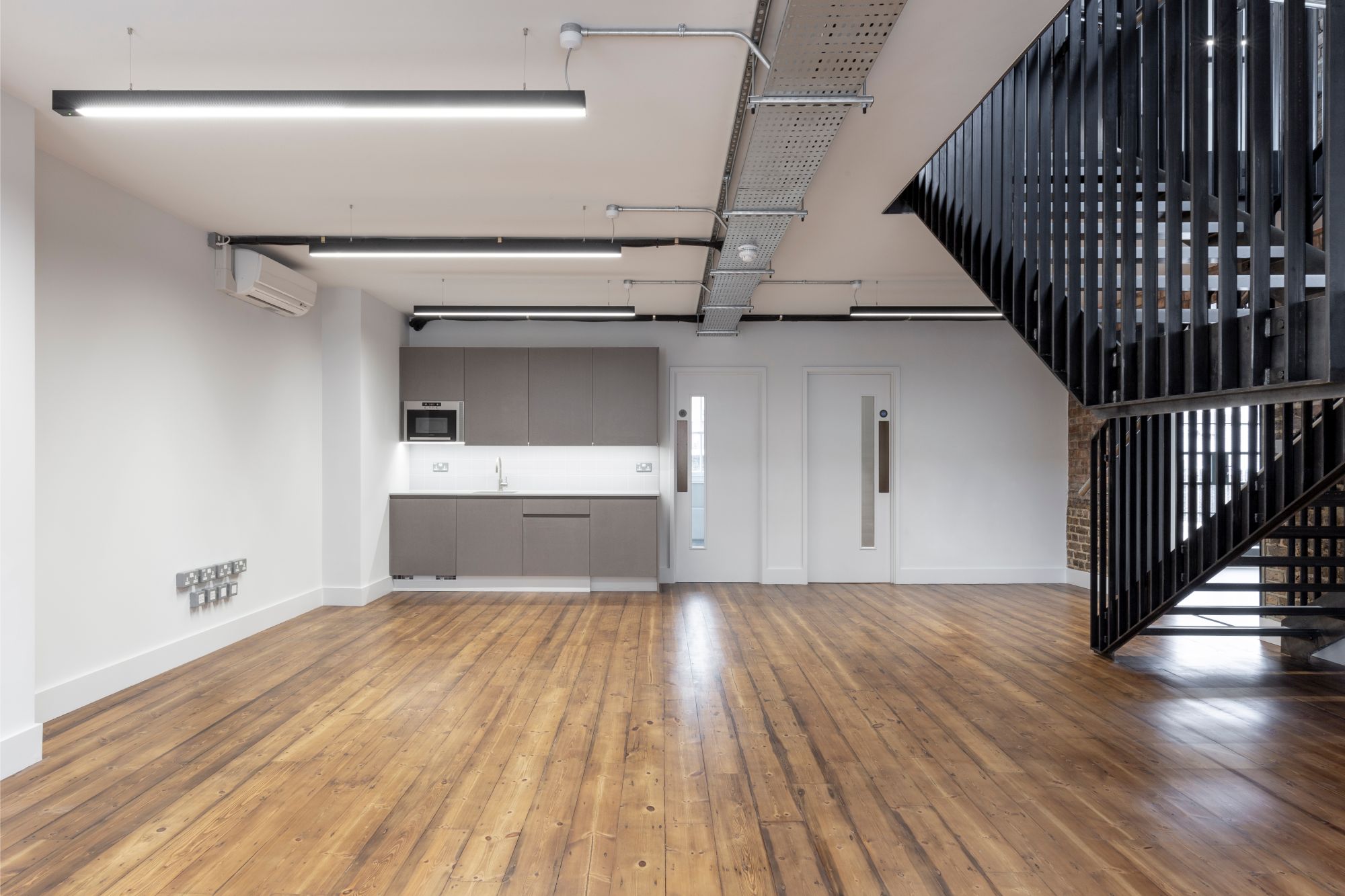 CAT A office fitout using PIR sensors at 42-44 Gerrard Street, London.