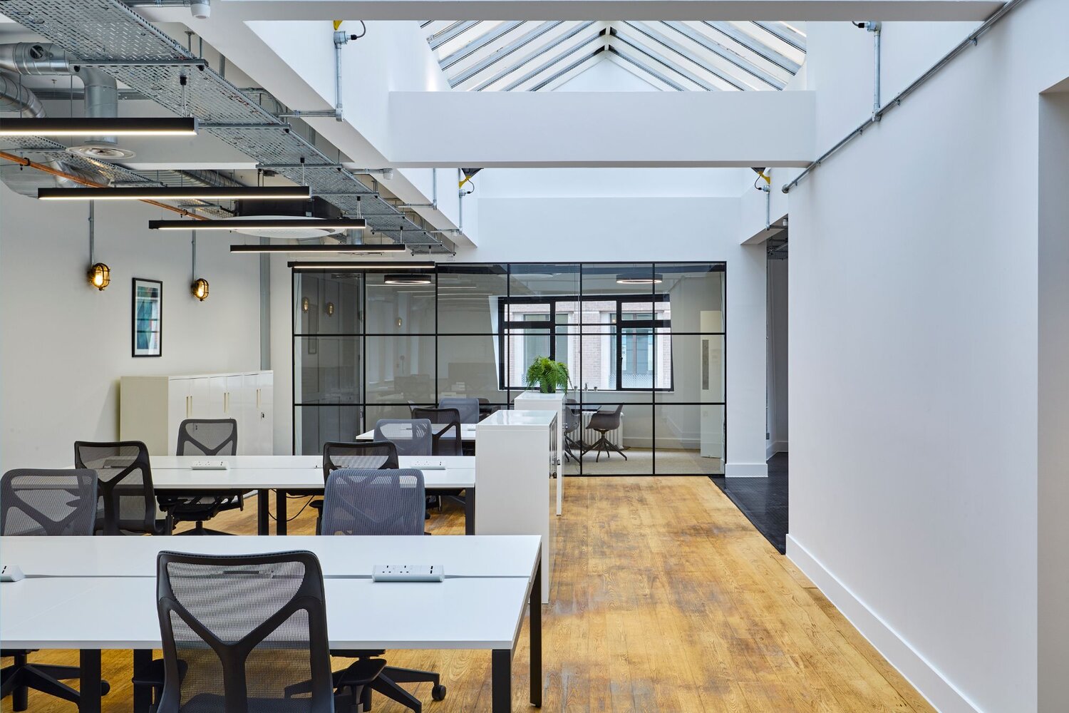 Office lighting for a high-end plug and play office space at 20 Dering Street, London.