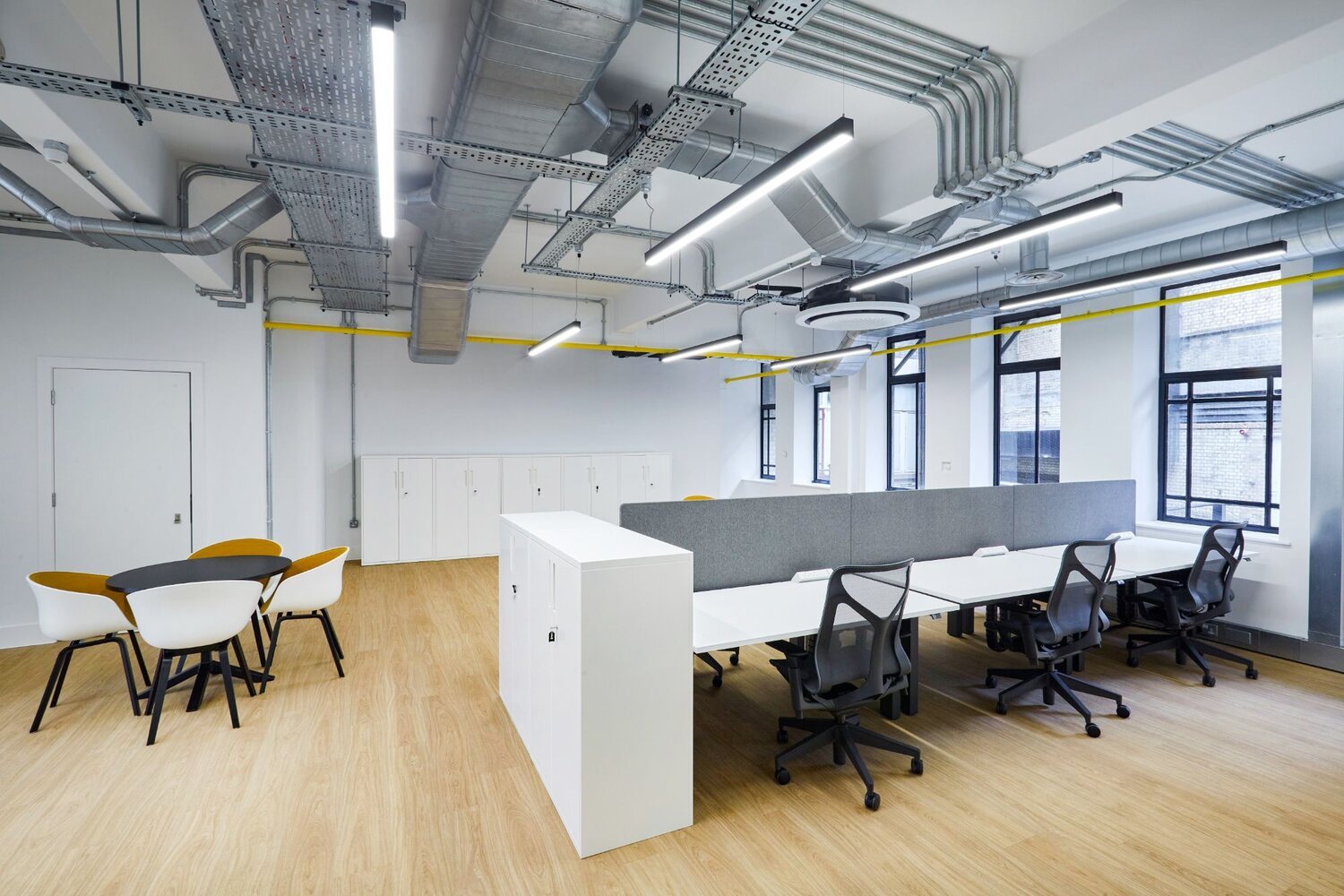 Office lighting for a high-end plug and play office space at 20 Dering Street, London.