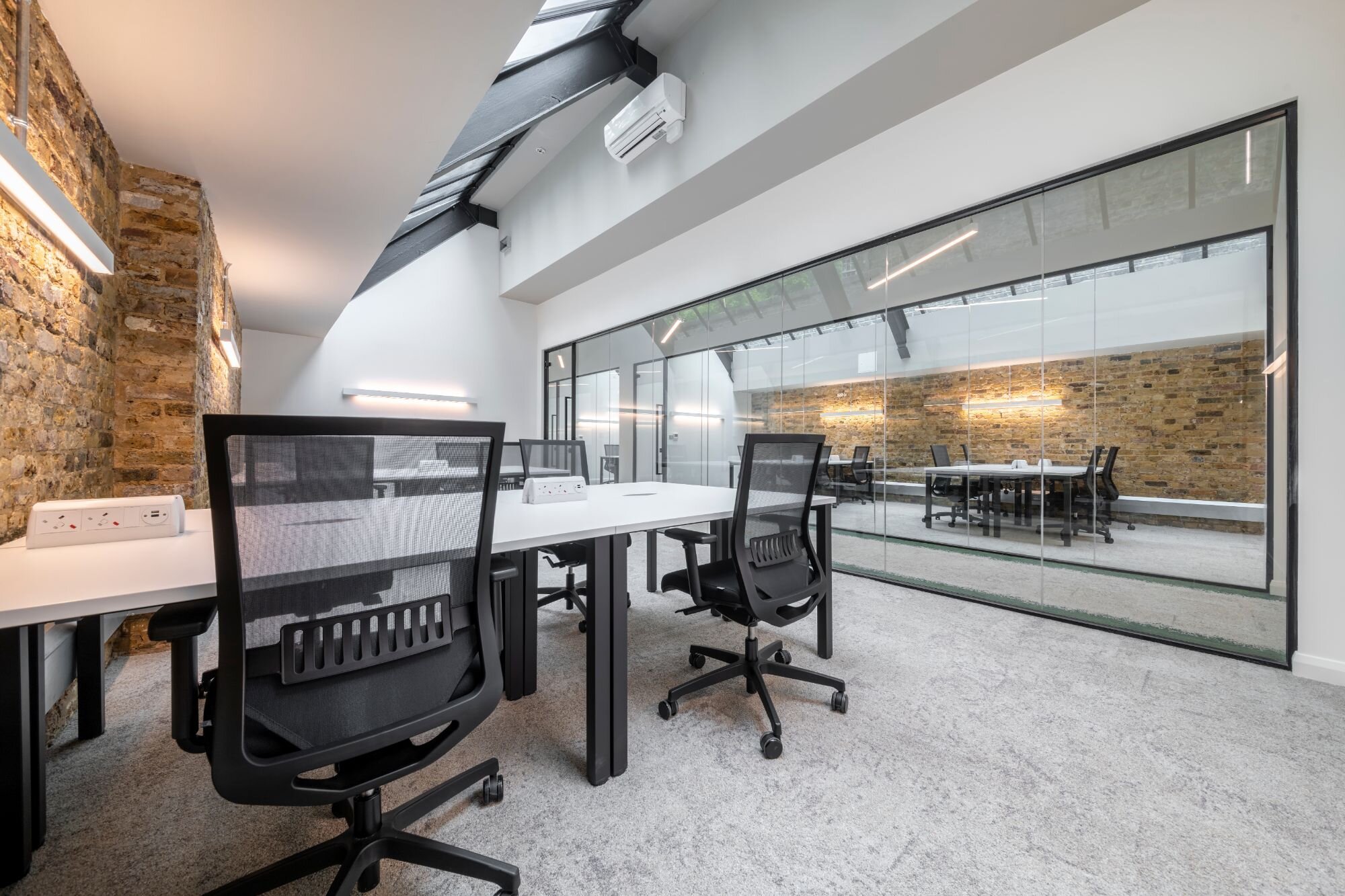 CAT B fitout for a design-led serviced office space at The Connolly Works, London.