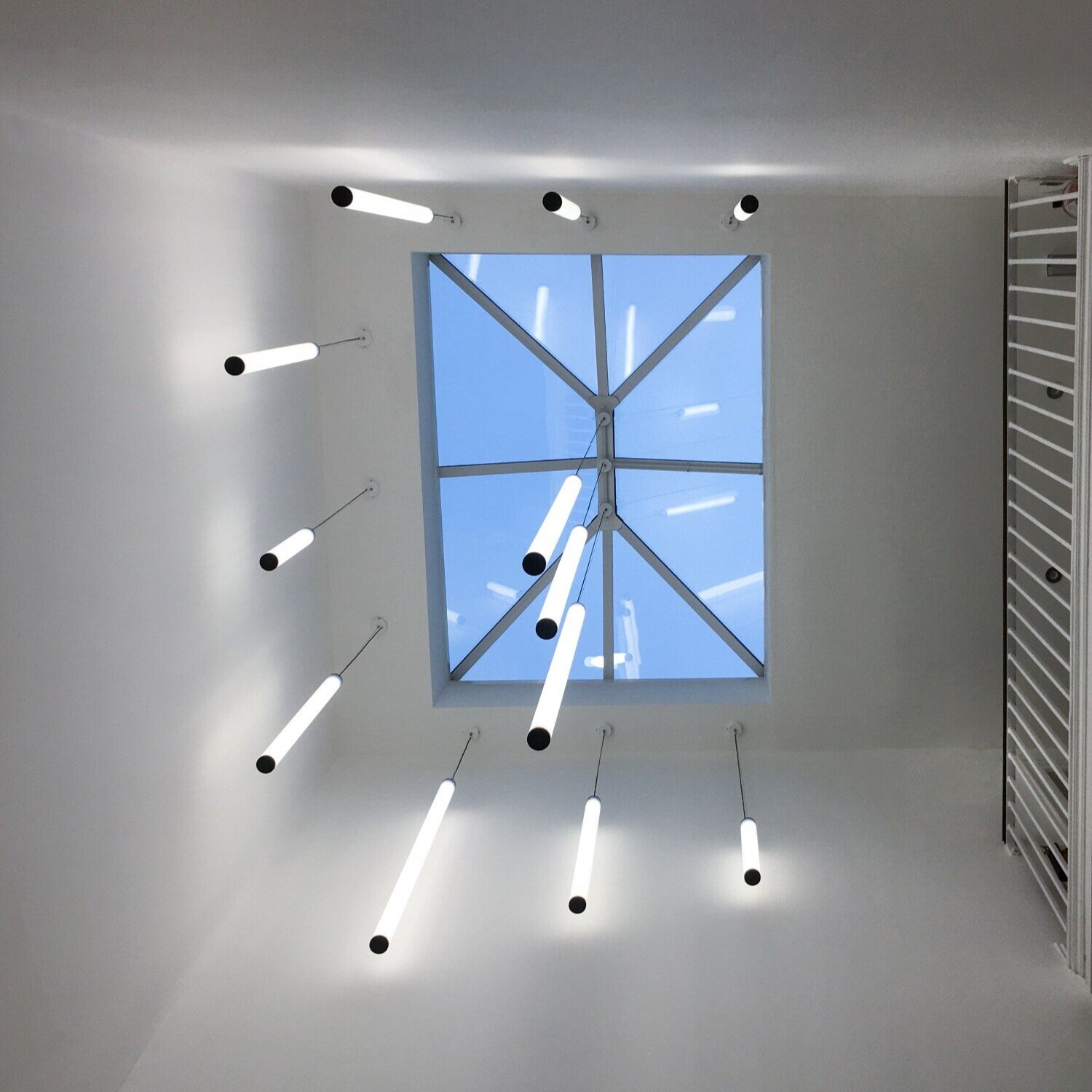 Architectural feature lighting for a CAT A office fitout at 9 Portland Square, Bristol.