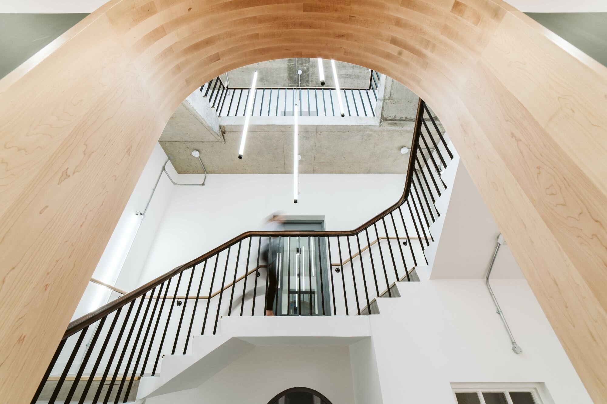 wooden-arch-way-suspended-vertical-lighting