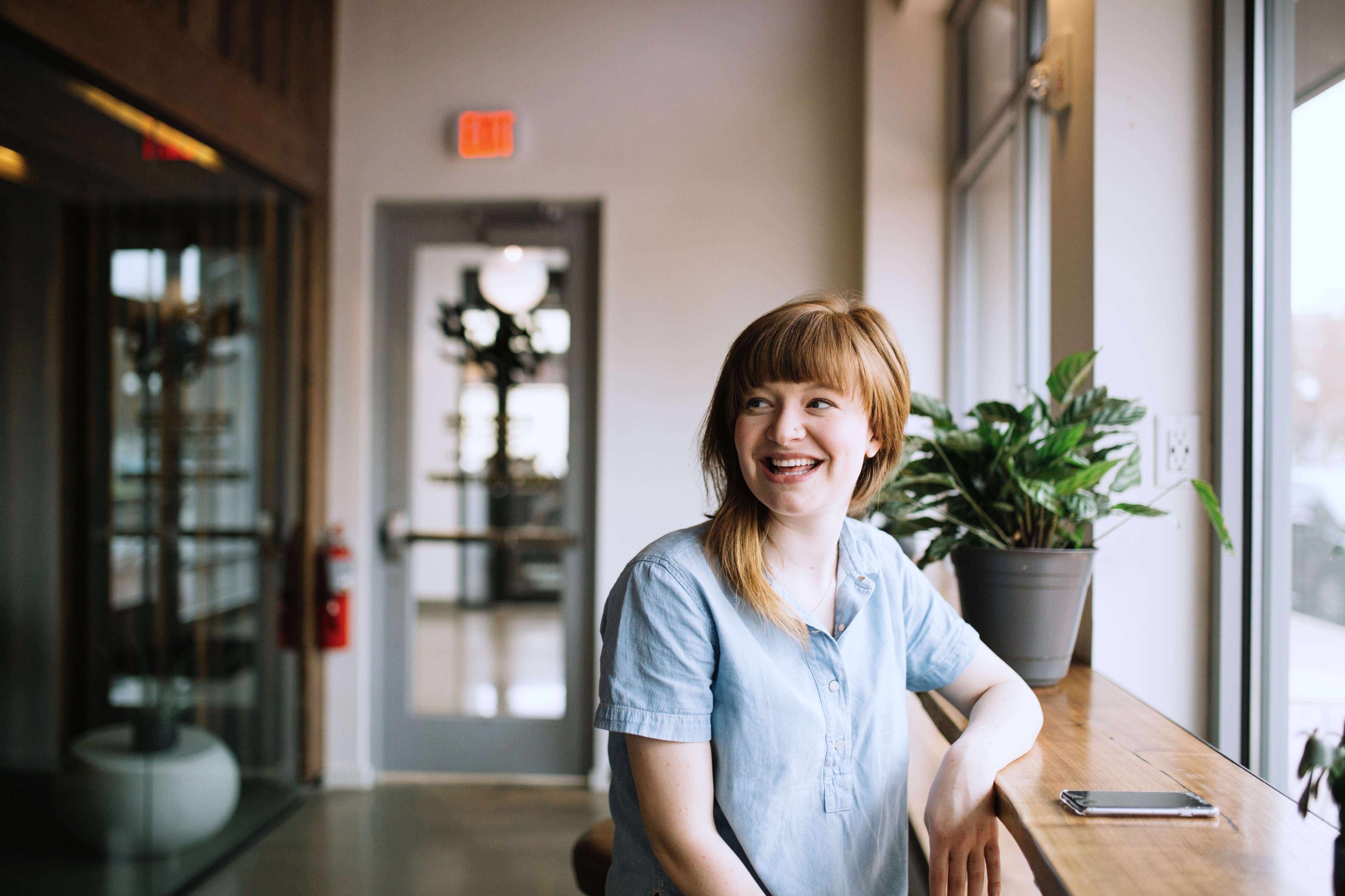 Lady at desk smiling