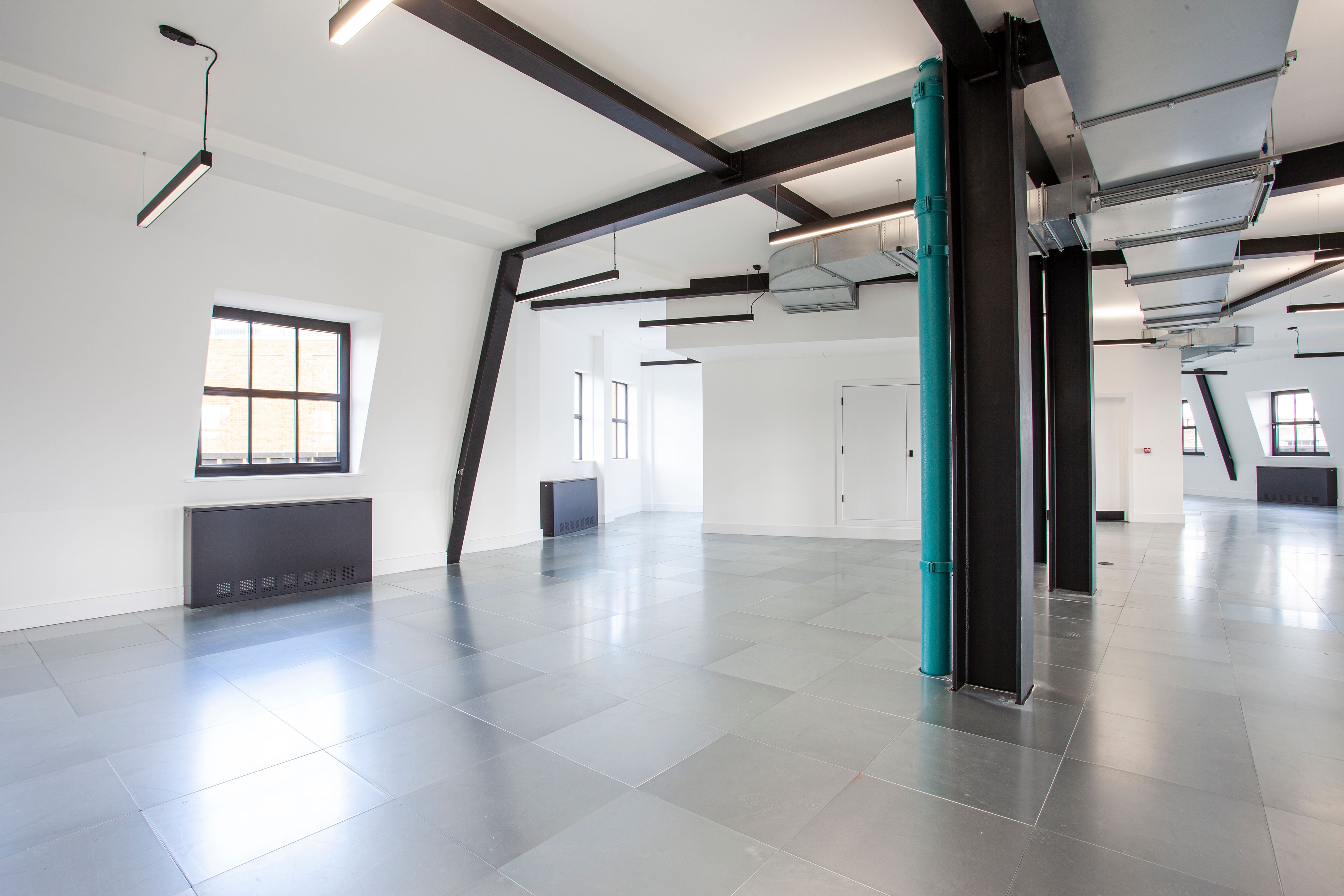 Office and architectural lighting for a warehouse style CAT A and CAT B fit out at The Hudson, 350 Kennington Lane, London.