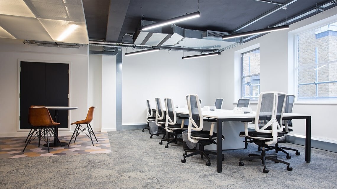 Office lighting for a design led serviced office space at 71-73 Carter Lane, London.